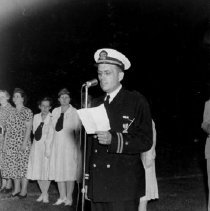 Edward A. Jacob Reads the Roll of Romeo's War Dead at Memorial Stadium